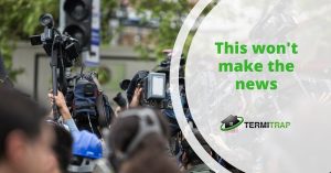 Image header that says "This won't make the news", with a background of press' cameras.