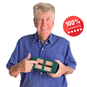 Ion Staunton holding a termite traps which is 5-stars 100% Guarantee as the featured image of the "termite control barriers" blog.